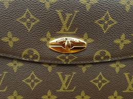 Louis Vuitton Vintage Mono Kelly lock detail